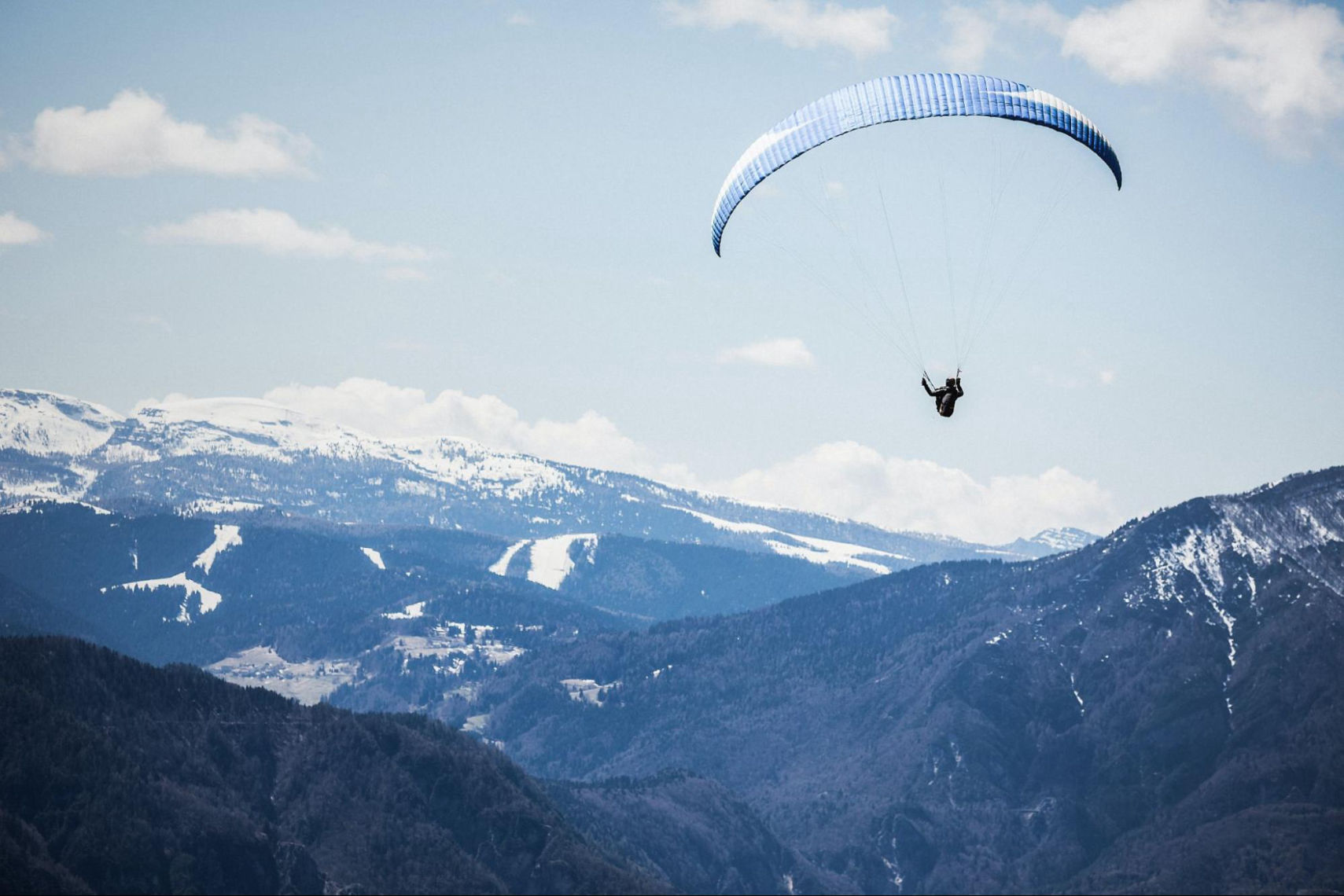 Paragliding adventure junkie flying through the skies