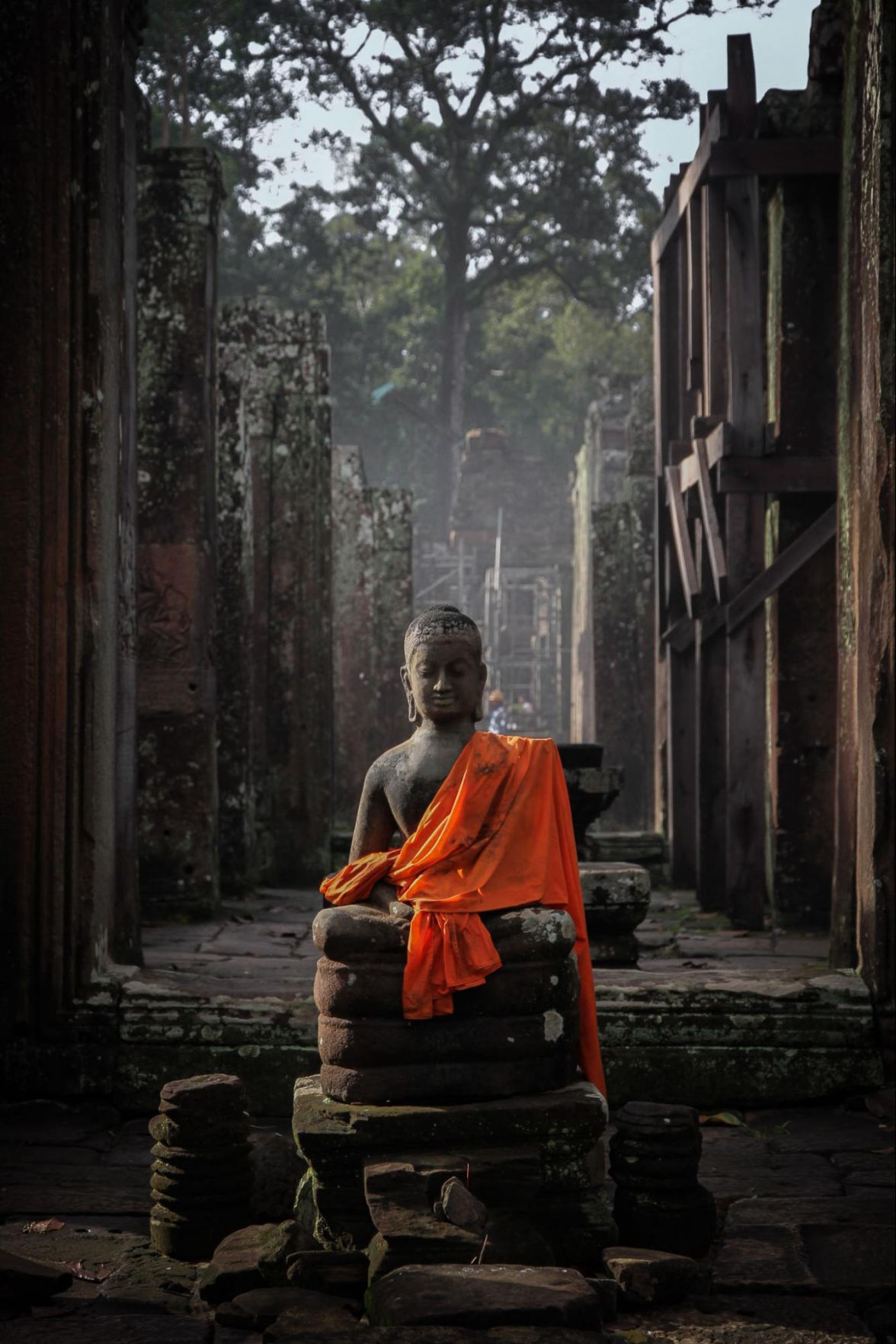 A statue of Buddha inside an old monastery.