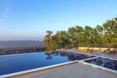 A Luxurious Getaway: Discover the Best Resort in Palampur with a Swimming Pool