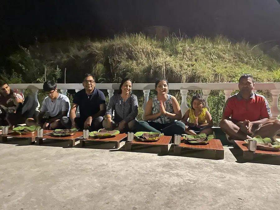 people enjoying food at the best resort in dharamshala with a pool