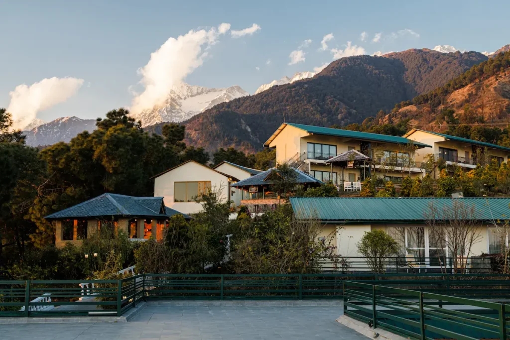 Rakkh Resort near Dharamshala set against forested hills and Himalayan mountain views