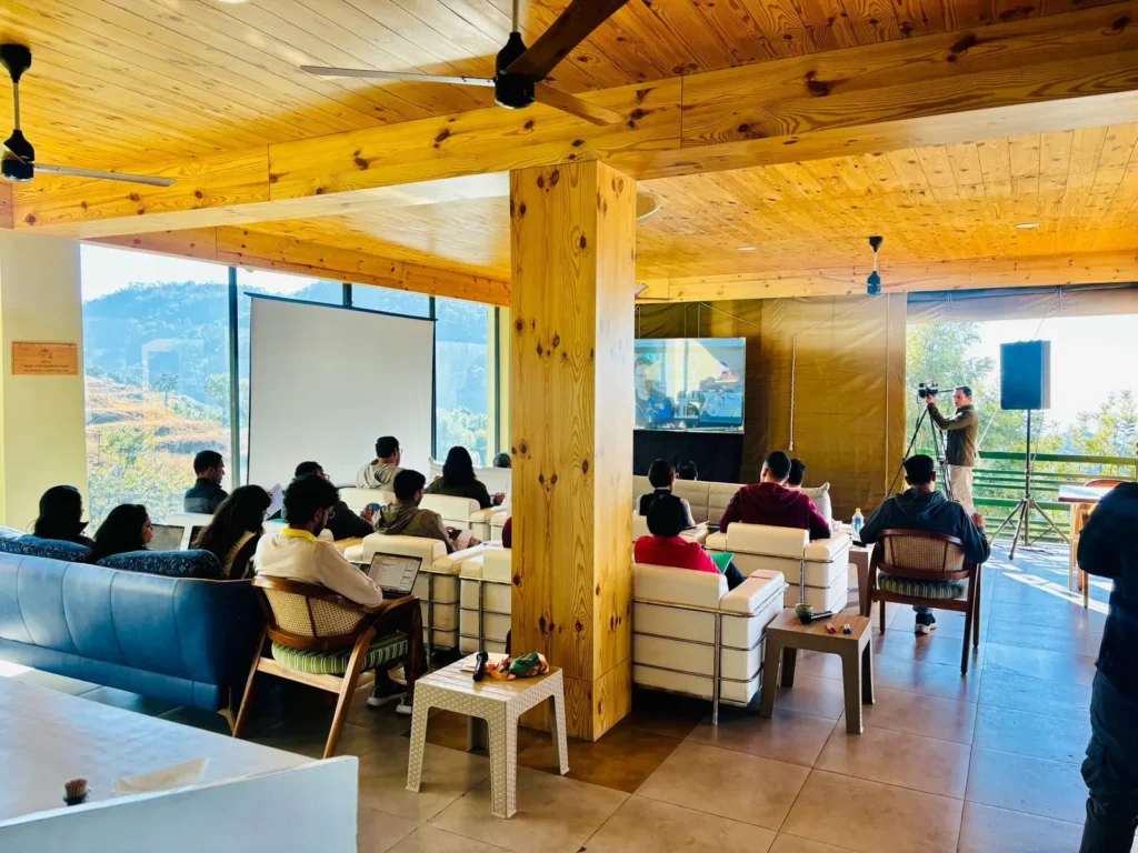 Team in genuine conversation during a Rakkh corporate retreat - what planning for connection looks like